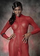 Black Natassia posing in red dress
